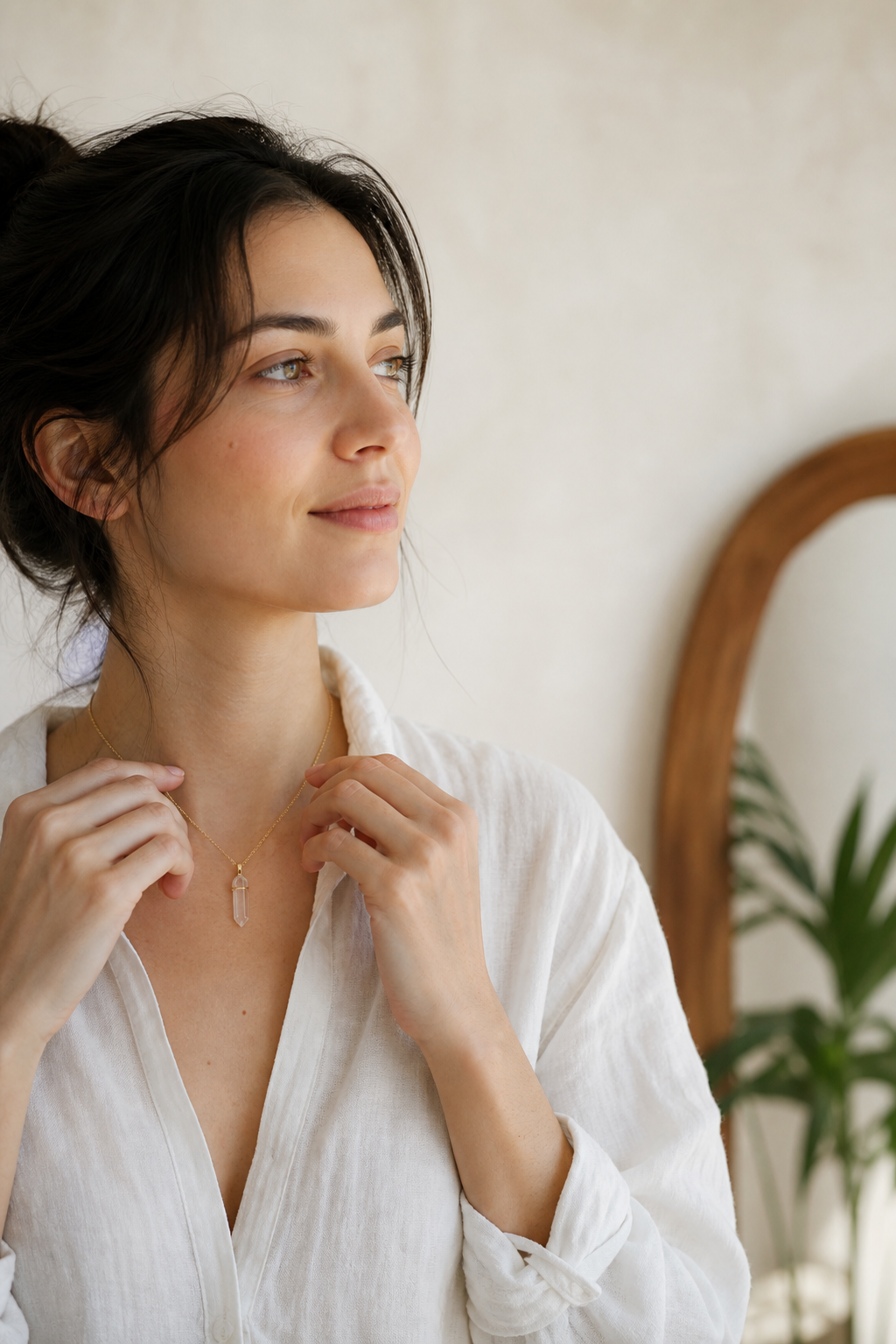 Woman wearing a clear quartz necklace